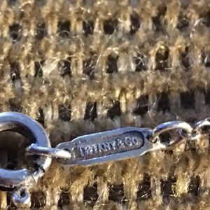 Tiffany’s beautiful .925 sterling silver starfish pendant and chain.